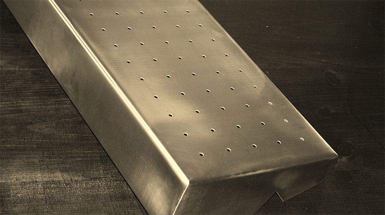 Perforated tray to use in display case